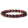 Macro detail of 8mm red tiger eye beads with natural chatoyancy effect on white background - Red Tiger Eye