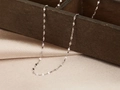 Minimalist silver titanium steel flat snake chain necklace draped on a wooden box - Lip Chain (Flat Chain) / 40+5cm / Silver