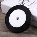 Single roll of 6mm black satin ribbon with smooth texture for DIY gift wrapping - Black