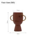 Terracotta ceramic abstract face vase with golden round handles and facial relief - Human Face Vase (565)