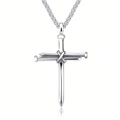Detailed view of silver cross pendant made of intertwined nails on a polished metal chain - Silver