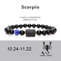 Detail of Scorpio zodiac bracelet featuring matte black agate beads and a blue focal stone - No Card / Scorpio
