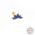 Macro shot of 925 sterling silver leaf earring with five blue marquise gemstones - Single Piece / Gold-Blue Zirconia