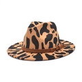 Detail of fedora hat with cow print pattern and brown leather band with gold buckle - M (56-58cm) / Camel