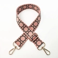 Detail of adjustable wide pink strap with geometric patterns and gold metal buckles - Silver Clasp / Pink