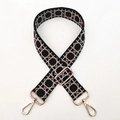 Close-up of adjustable woven strap with beige geometric lattice pattern and gold hooks - Silver Clasp / Black