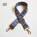 Detail of adjustable canvas bag strap with ethnic geometric patterns and gold metal buckles - Navy Red White Green Geometric (03) / Gunmetal Buckle