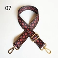 Detail view of ethnic style jacquard shoulder strap with golden metal lobster clasps - Red Black White Geometric Jacquard (07) / Gunmetal Buckle