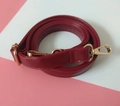 Detail of red PU leather replacement strap with gold metal buckles and adjustable slide - Burgundy