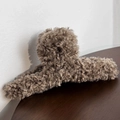 Close-up of soft brown plush shark hair claw clip showing fluffy teddy texture details - Coffee