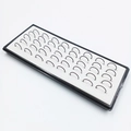 Black C-shaped stainless steel nose rings displayed in a white foam padded jewelry box - Black 8mm