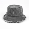 Detail of grey washed denim sun hat featuring frayed edges and vintage distressed textures - One Size / Gray