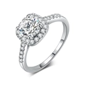 Close-up of four-prong round zircon with halo setting and side stones on silver ring - Square Platinum White Stone / Size 9.5