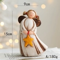Vista detallada de ángel de resina con estrella indicando medidas 15cm x 9cm y peso 180g - Estilo A Estrella Grande