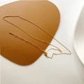 Collana a doppio strato in acciaio al titanio dorato con ciondolo a orso e perle d'acqua - Catena sottile in acciaio al titanio