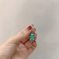 Mint green bear pendant in rose gold diamond-encrusted loop on a stainless steel necklace - Micropaved Green Bear Pendant