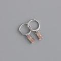 Detail view of silver hinged hoop earrings featuring rectangular champagne gemstones - Rectangular Pink Rhinestone Earrings (S-E1536) / Silver