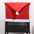 Detail of red and white Christmas hat chair cover on a mesh chair back for party decor - Non-woven Fabric Chair Cover