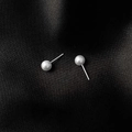 Macro shot of minimalist white pearl earrings on black silk texture background - S925 Silver Needle-6mm