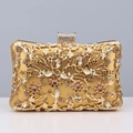 Close-up of gold evening clutch featuring intricate crystal-encrusted floral patterns - Dark Gold