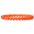 Detailed close-up of 6mm polished orange agate beads on an elastic bracelet - Orange Red Cat Eye