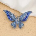 Detailed butterfly brooch with blue crystal rhinestones on a silver metal base - Style 65/Silver Blue Series