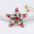 Christmas star brooch with red and green crystals on a vintage gold alloy base - Pentagon Flower
