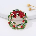 Christmas wreath brooch featuring green enamel leaves and colorful rhinestones - Christmas Wreath
