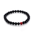 Matte black agate beaded bracelet featuring a single red turquoise accent bead - Matte Black Agate with Red Turquoise (KB128927-Z)
