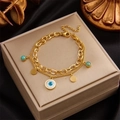 Zweilagiges goldenes Edelstahlarmband mit blauem Evil Eye und Türkis-Anhängern - Gold