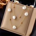 French retro gold layered chain necklace with baroque pearls and gold beads on beige box - Double Layer Baroque Pearl Style (N1809)