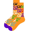 Orange mid-calf cotton socks featuring colorful spiral patterns and purple toe accents - Orange Spiral