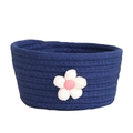 Detail of dark blue woven cotton rope storage basket featuring white and pink fabric flowers - Small / Navy Blue