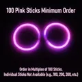 Luminous pink glow stick bracelet for parties and concerts on a black background - Pink