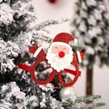 Occhiali da festa di Natale con montatura Babbo Natale glitterata rossa su albero di neve - Stile Babbo Natale