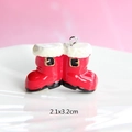 Macro shot of red resin Christmas boot pendant with gold loop and 2.1x3.2cm size text - Style 19-Red and White Christmas Boot