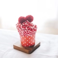 Red and white polka dot coral fleece socks in a creative cupcake gift box with pom-poms - One Size / Bright Red & White