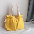 Borsa tote in tela giallo vivace con chiusura a coulisse e manici bianco avorio - Giallo