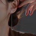 Minimalist silver needle threader earrings with sleek X-shaped decorative letter design - Letter X