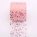 Detail of pink tulle roll with golden stars for DIY hair bows and dress accessories - Pink