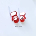 Detailed macro view of 13x20mm red glitter Christmas glove charms with snowflake patterns - Snowflake Glove