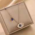 Collana con malocchio dorata con cristallo blu e zirconi su scatola porta gioielli - Oro rosa