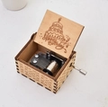 Hand-cranked wooden music box featuring a carved happy birthday design and metal movement - Happy Birthday 3