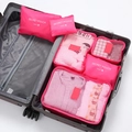 Travel packing cubes six piece set displayed inside a suitcase, perfect for organizing clothes. - Rose Red