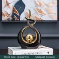 Scultura moderna astratta in ceramica nera e oro per un elegante arredo casa - 17x6x27cm / Nero Oro (Corto)