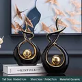 Modern black and gold ceramic abstract statues for luxury home living room decor - Morning Song Style Black Gold Pair - Large