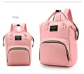 Front detail of pink Oxford cloth mummy bags with Living Traveling Share label - Nude Pink