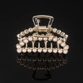 Macro detail of gold alloy hair claw clip featuring inlaid faux pearls and sleek rhinestones - Gold Full Pearl Small Moon Claw Clip