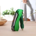 Penna a sfera mini verde creativa con tagliaunghie integrato e anello portachiavi - Verde