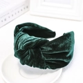 Detailed macro view of dark green velvet headband with a stylish knotted wide-brim design - Dark Green